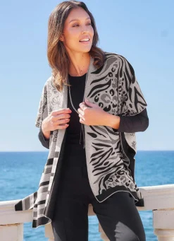 Online Poncho mit edlem Jacquard-Dessin Damen Strickwesten