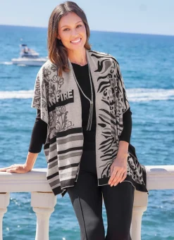 Online Poncho mit edlem Jacquard-Dessin Damen Strickwesten